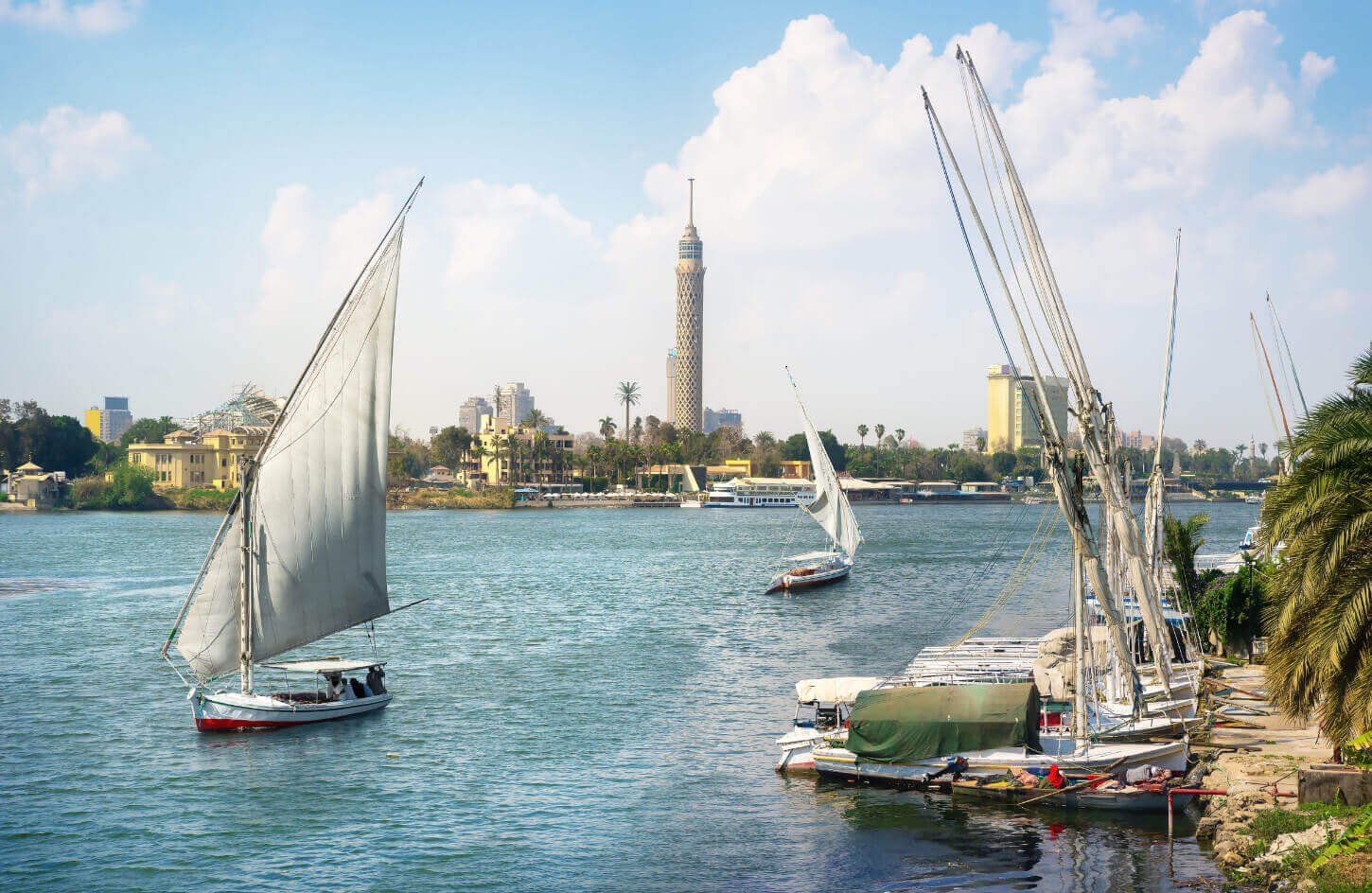 a-snapshot-of-the-felucca-in-cairo-at-the-nile-river-with-the-cairo-tower